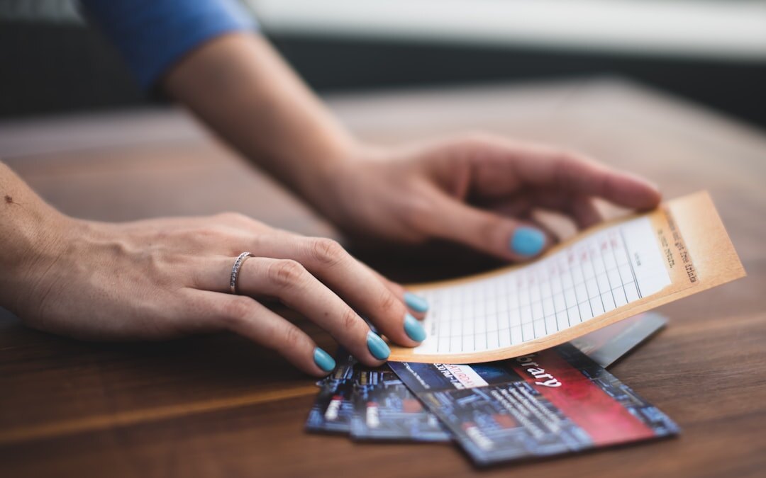 person comparing insurance documents