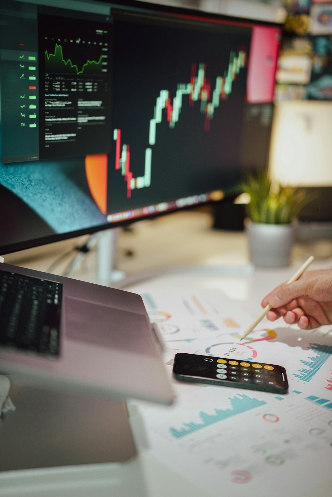 person analyzing financial charts