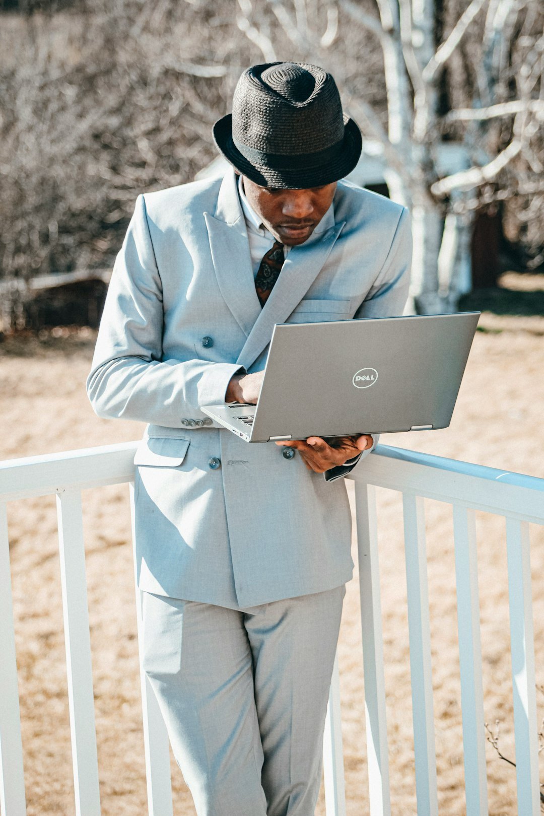 businessman using laptop for budgeting